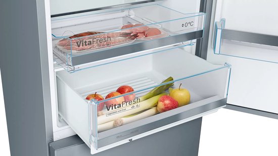 VitaFresh-lades met voedsel, waaronder vlees, kip, wortelen, appels en prei.