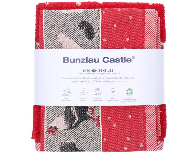 Torchons rouges à pois blancs et bordure de coqs, emballés avec une étiquette 'Bunzlau Castle'.