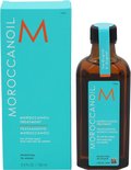 Amberkleurige fles met blauw label "MOROCCANOIL TREATMENT" en doos. Inclusief pompdispenser.
