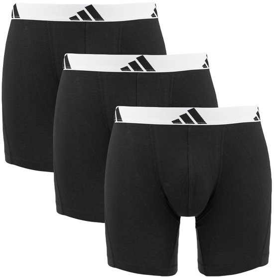 Drie zwarte boxershorts opgestapeld, met witte tailleband met adidas logo.