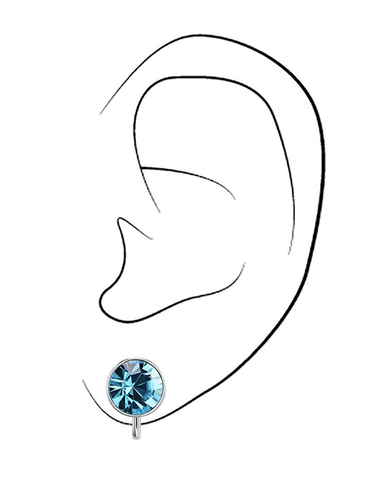 Illustration d'une oreille avec un clip d'oreille Traveller en cristal bleu