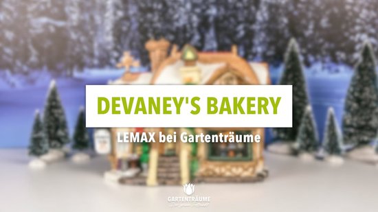 Lemax 'Devaney's Bakery' gebouw met tekst overlay in winterlandschap.
