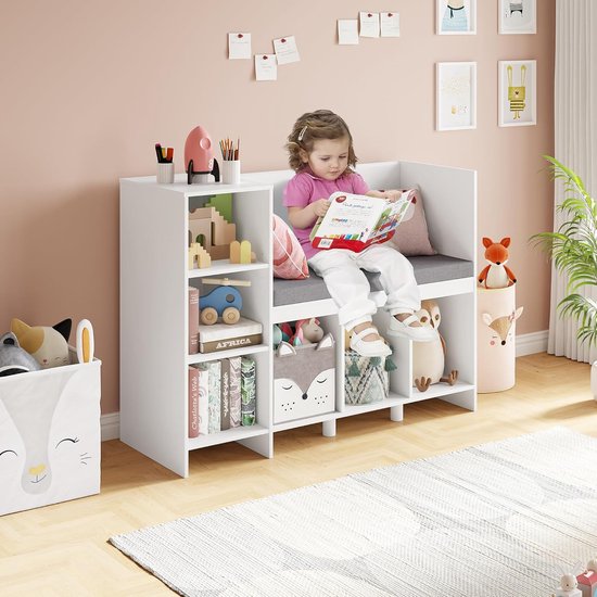 Kinderboekenkast met Speelgoedrek en Kussen, voorzien van 6 Opbergvakken. Ideaal voor Kinderkamers, Speelkamers en Kleuterscholen. Kleur: Wit, Afmetingen: 80,5 x 40 x 110 cm