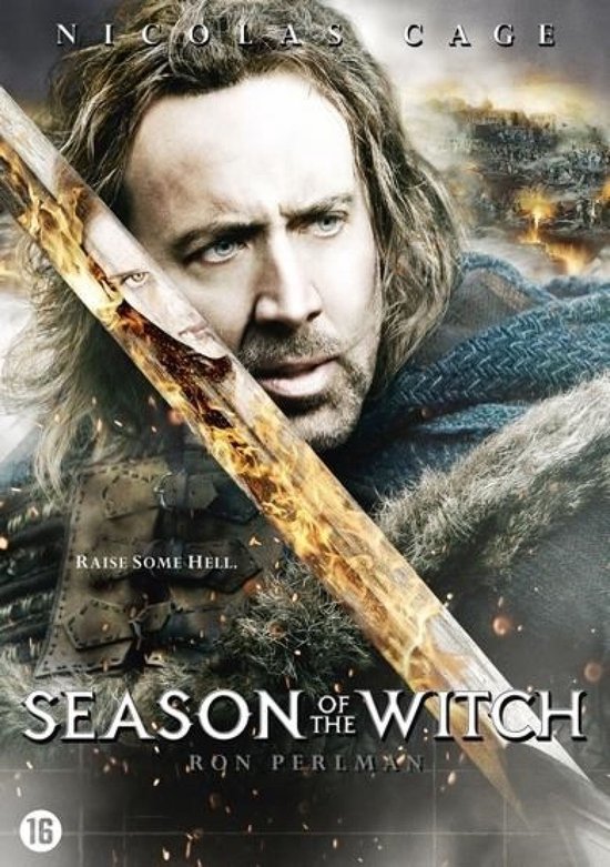 Nicolas Cage met lang bruin haar en baard, met een vlammend zwaard voor zich. "RAISE SOME HELL."