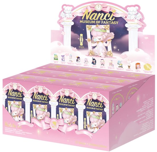 Doos van Nanci Museum of Fantasy poppen in het roze met een klok.