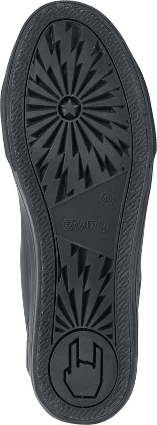 Zool van zwarte sneaker met bliksemmotief en hand-/rock-'n-roll-symbool.