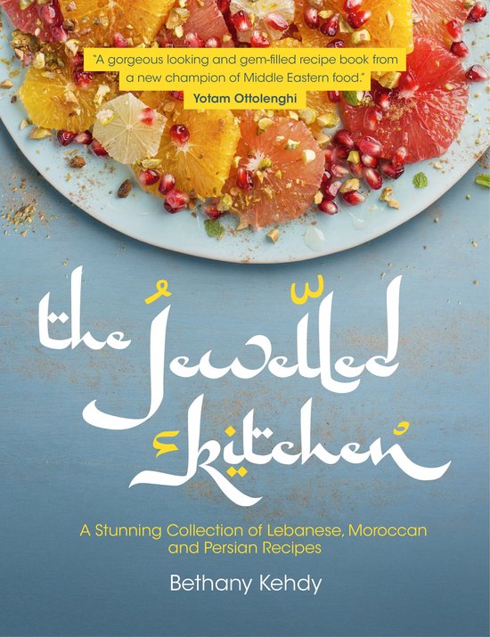 Boekomslag van 'The Jewelled Kitchen' met citrusvruchten en granaatappel. Yotam Ottolenghi quote.