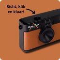 Detail van de bruine lederlook voorkant van de Camp Snap camera.