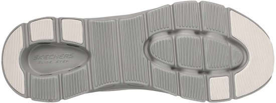 Grijze Skechers Glide-Step instapper zool met witte accenten en ribbels.