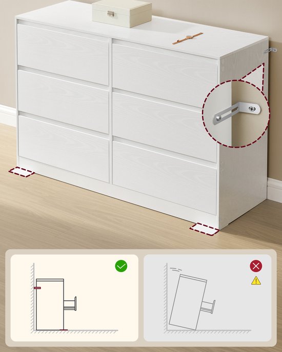 Commode blanche à 6 tiroirs, avec démonstration de fixation anti-basculement et dégagement au sol.