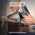 Zwart racestuur dat aan een bureau wordt bevestigd met innovatieve klemmen. Maximale dikte bureau: 2,05 inch.