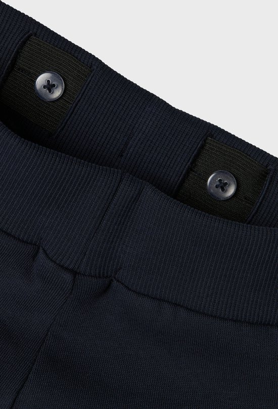 Donkerblauwe joggingbroek met elastische tailleband en knopen.