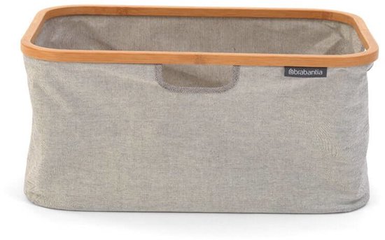 Grijze Brabantia wasmand met bamboe frame, op witte ondergrond.