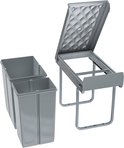 Grijze vuilnisbakken van de uittrekbare afvalbak en het metalen frame met geleiders.