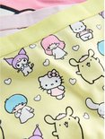 Pastelgele onderbroek met een all-over print van Hello Kitty, My Melody, Cinnamoroll en Keroppi, met kleine hartjes.