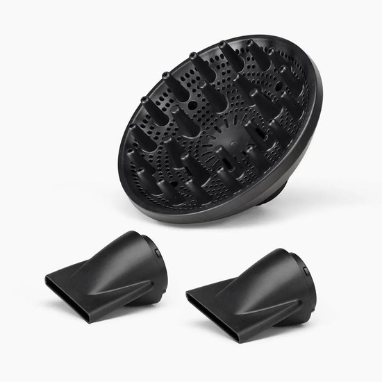 Zwarte diffuser en twee mondstukken voor een föhn.