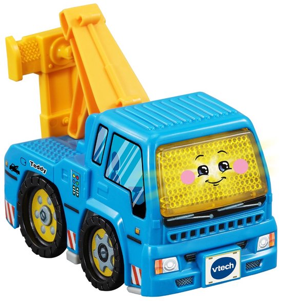 Blauwe takelwagen met gele kraan en een gezichtje op de voorruit. "Teddy" staat op de zijkant.