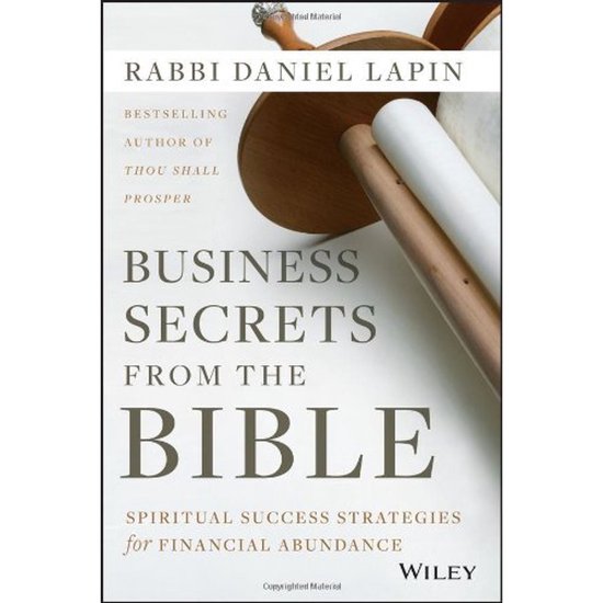 Boek "Business Secrets from the Bible" van Rabbi Daniel Lapin, met subtiele afbeelding van houten objecten.