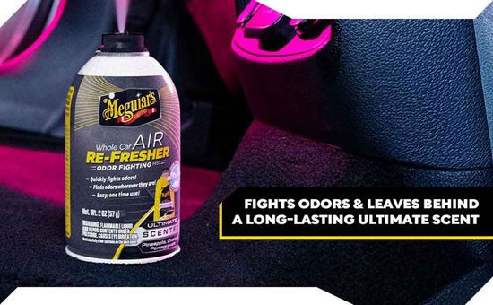 Meguiar's Whole Car Air Re-Fresher, 2 oz., in een auto-interieur.