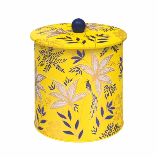 Boîte de conservation ronde, jaune, avec des feuilles bleues et dorées et un oiseau exotique.
