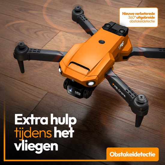Oranje drone op houten vloer met obstakeldetectie. Met 360 graden obstakeldetectie.
