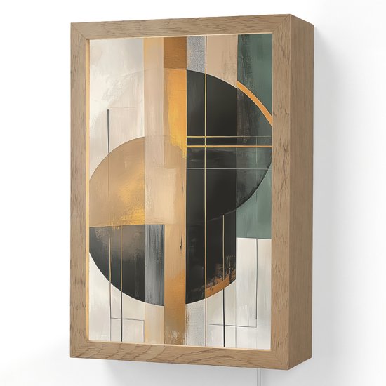 Peinture abstraite avec cercles et lignes or, vert et noir, dans un cadre en bois, fixée au mur.