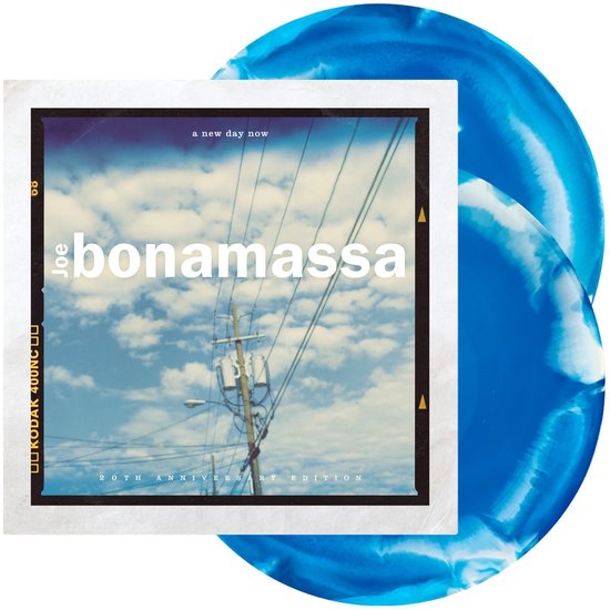 Albumhoes 'A New Day Now' van Joe Bonamassa, 20th Anniversary Edition, met blauwe marmeren vinylplaten.