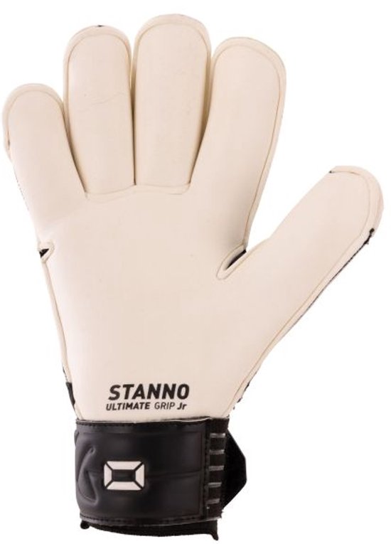 Beige keepershandschoen met zwarte band en STANNIO ULTIMATE GRIP Jr tekst.