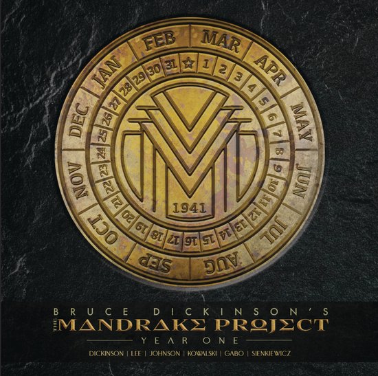 Gouden medaille met maandenkalender en 'VM' logo, '1941' centraal, onderaan "BRUCE DICKINSON'S THE MANDRAKE PROJECT YEAR ONE".