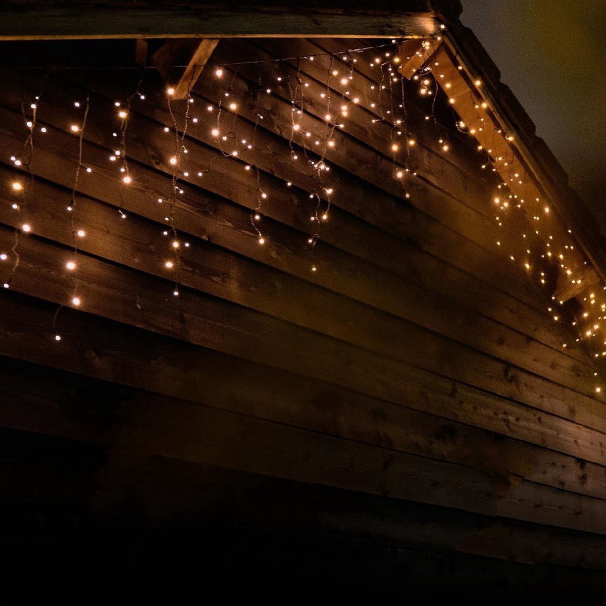 Lichtgordijn - Ijspegelverlichting - LED gordijn - Kerstverlichting - 1000 LED - Met Afstandsbediening - Voor binnen en buiten - 20 meter (2 x 10 m) - Koppelbaar - Warm wit – foto 7