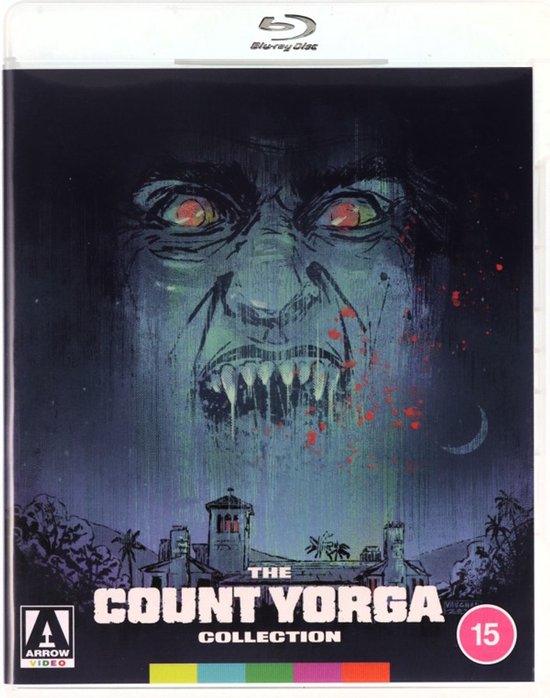 De voorkant van de Blu-ray disc-hoes voor The Count Yorga Collection. Toont een enge close-up van het gezicht van een vampier boven een herenhuis. Bevat een leeftijdsclassificatie van 15.