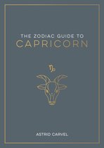 Livre : Le Guide du Zodiaque pour le Capricorne, avec la tête stylisée dorée d'une chèvre et le symbole du Capricorne sur une couverture gris foncé.