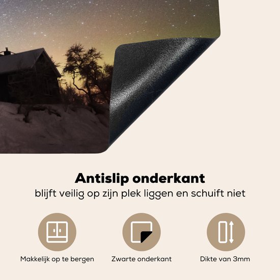 KitchenYeah® Inductie beschermer 81.6x52.7 cm - Sterrenhemel - Landschap - Zweden - Sneeuw - Winter - Kookplaataccessoires - Afdekplaat voor kookplaat - Inductiebeschermer - Inductiemat - Inductieplaat mat