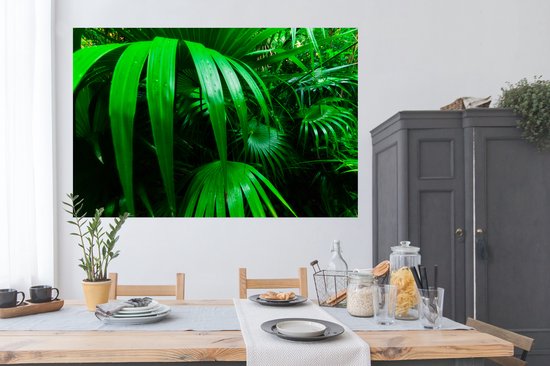 Poster Feuilles de palmier dans la jungle 180x120 cm - Tirage photo sur Poster (décoration murale salon / chambre) XXL / Groot format!