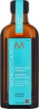 Bruine glazen fles Moroccanoil Treatment met turkoois label. Bevat 100 ml en is alcoholvrij.