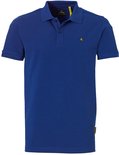 Blauw NOMAD poloshirt met korte mouwen, knopen, kraag en een NOMAD logo.