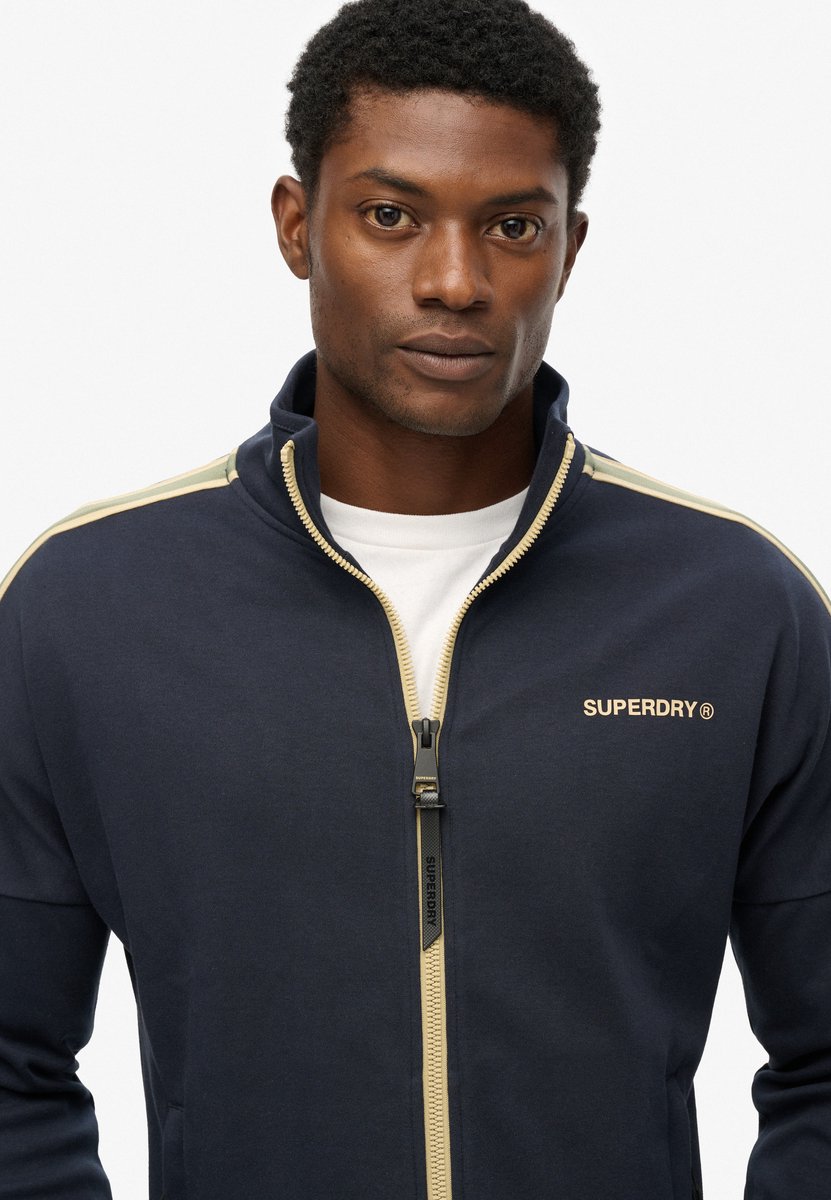 Superdry Tech Cult trainingsjack met losse pasvorm Heren Truien Marineblauw