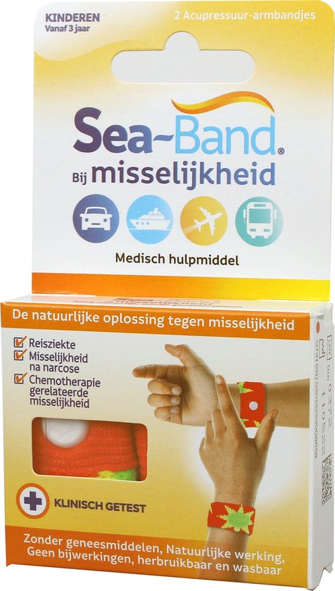 Oranje Sea-Band polsbandje met groene sterren en een rode knoop voor acupressuur, voor kinderen vanaf 3 jaar.