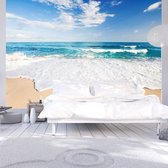 Fotobehangkoning - Behang - Vliesbehang - Fotobehang - Golven in Zee - Strand - 150 x 105 cm