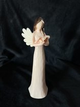 Une belle statue d'ange, ange avec un livret .20cm