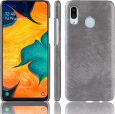 Schokbestendige Litchi Texture PC + PU-hoes voor Galaxy A20e (grijs)