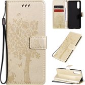 Voor Sony Xperia 10 II Tree & Cat reliÃ«fpatroon Horizontale flip lederen tas met houder & kaartsleuven & portemonnee en lanyard (goud)