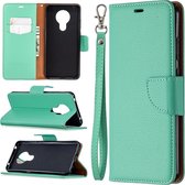 Voor Nokia 5.3 Litchi Texture Pure Color Horizontale Flip Leather Case met Houder & Kaartsleuven & Portemonnee & Lanyard (Groen)