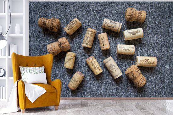 Quelques bouchons sur fond gris fond d' fotobehang