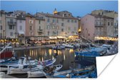 Poster De haven van Saint-Tropez tijdens schemering in Frankrijk - 180x120 cm XXL
