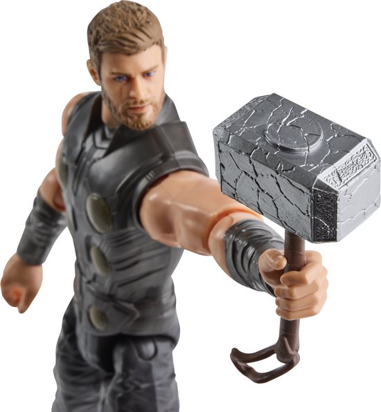 Thor actiefiguur in grijs pantser, houdt Mjolnir voor zich
