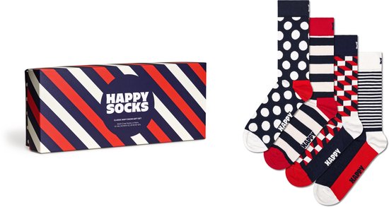 Happy Socks giftbox met gestreepte patronen. Vier paren sokken: marineblauw met witte stippen, gestreept, rood met witte blokken, en marineblauw met witte strepen.