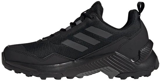 Zijkant van zwarte dames wandelschoen van adidas Terrex RAIN.RDY met veters en profielzool.