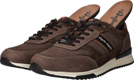 Binnenzijde van bruine leren sneakers met uitneembare binnenzolen en 'Australian' logo.