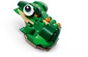 Groene LEGO-kikker met grote ogen en een bruine buik.